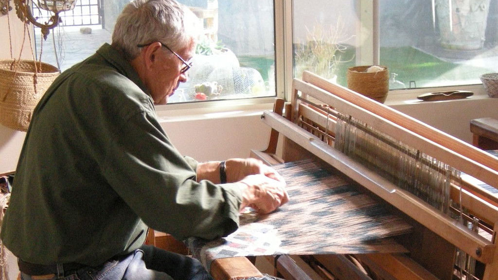 craft in america center Jim Bassler at the loom