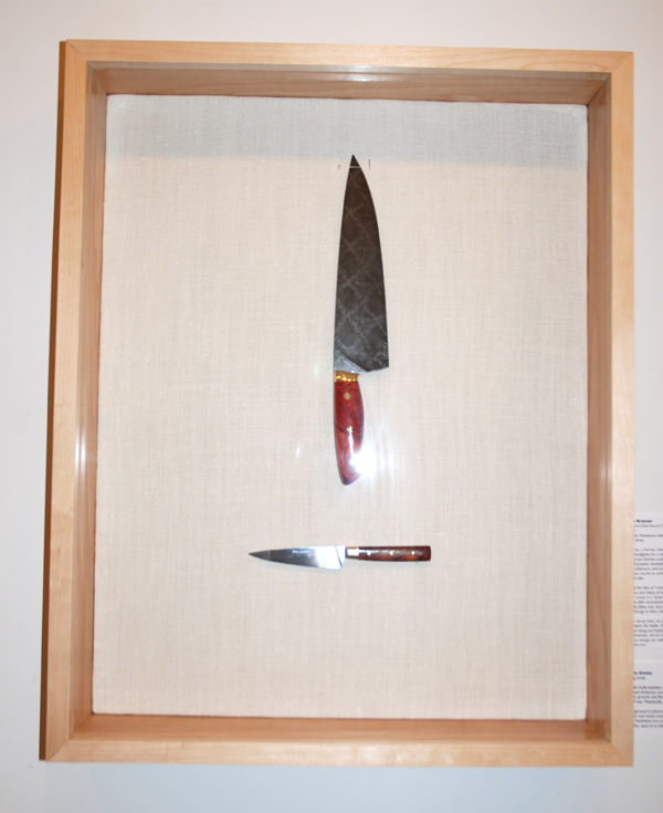 Top: Bob Kramer, 10 inch Chef (Euro) Damascus Knife, 2012. Mosaic Damascus steel, forge welded, dyed buckeye burl, brass Bottom: Adam Simha, Pairing Knife, 2012. Sandvik13c26 stainless steel at Rc59 hardness, bronze, stabilized Amboyna wood burl, mosaic pin. Hand cut, shaped, ground, and finished. Heat treating by Peters’ Heat Treat, Meadeville, PA