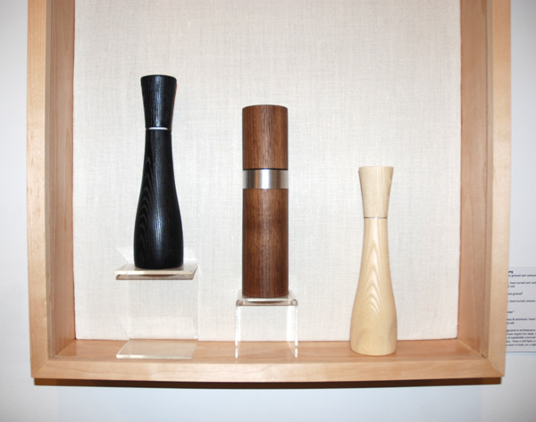 Fritz Muegenburg, Peppermill, 10 curve grained and carbonized, 2012. American white ash, hand turned and carbonized with ceramic CrushGrind mill; Peppermill, 10 curved grained, 2012. American white ash, hand turned ceramic CrushGrind mill; Peppermill, 10 cylinder, 2012. American black walnut & aluminum, hand turned with ceramic CrushGrind mill