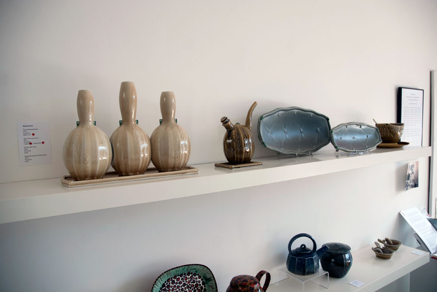 Marlene Jack, Trio of Nesting vases, Oil pot with Tray, Pair of Serving Trays, 2013. Porcelain, Madison Metro photograph