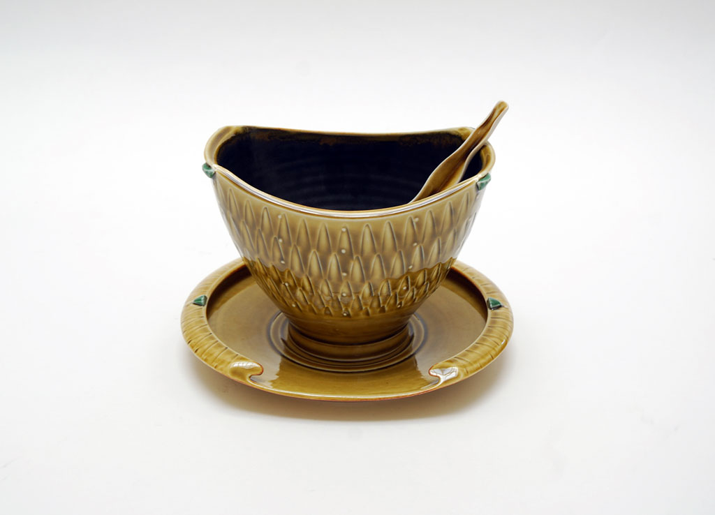 Marlene Jack, Small Serving Bowl with Spoon, 2013. Porcelain, Madison Metro photograph