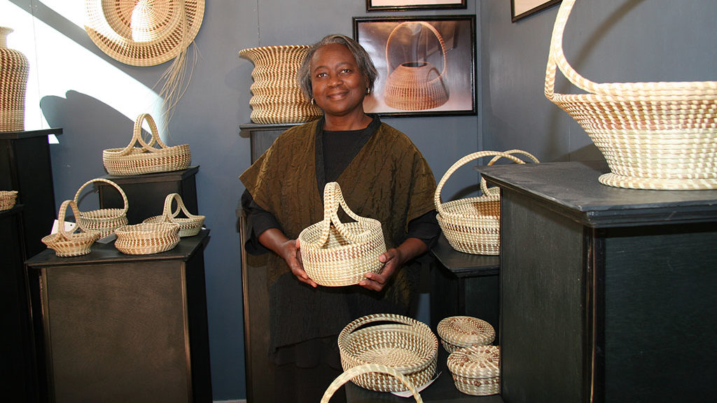 Mary Jackson with her baskets. Jennifer Gerardi photograph, Craft in America