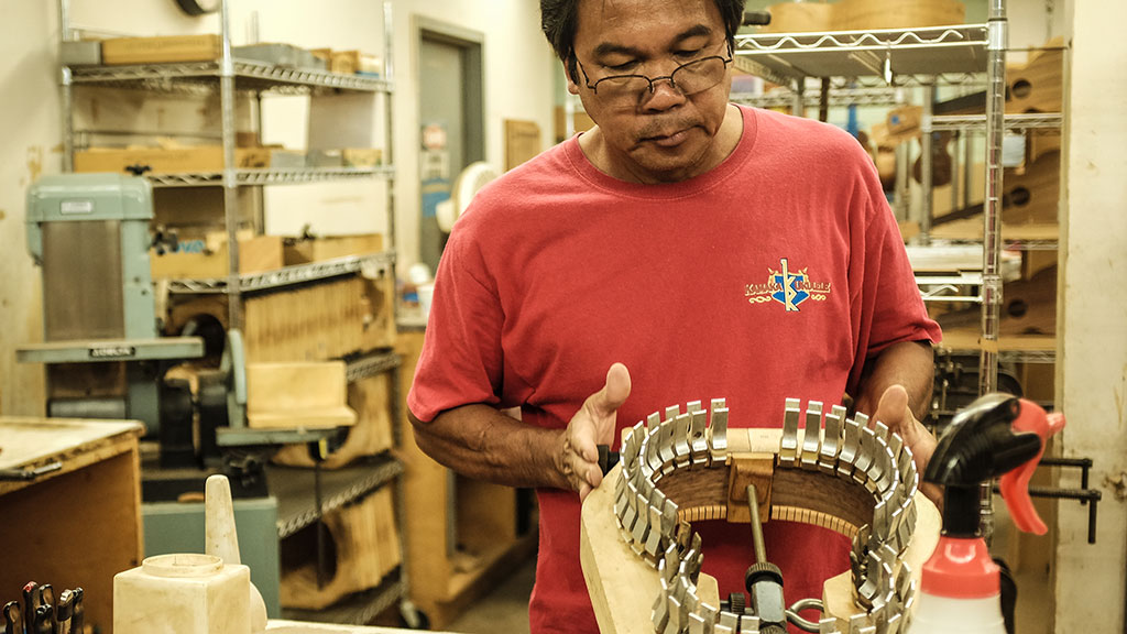 Rostico Fiesta works on the ukulele body. Mark Markley photograph