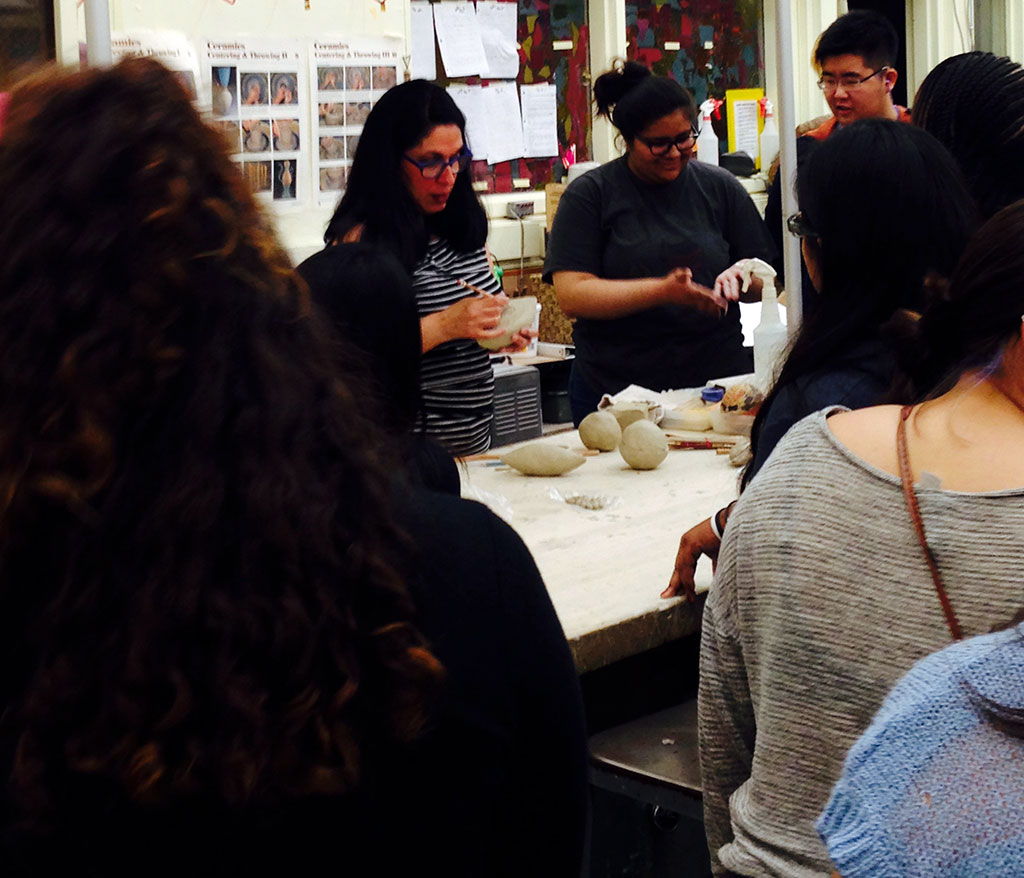 Mary Oligny demonstrates ceramic techniques at Fairfax High School Arts Magnet