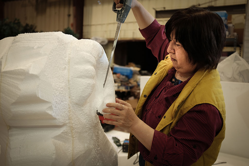 Yumei Hou sculpting a sheep