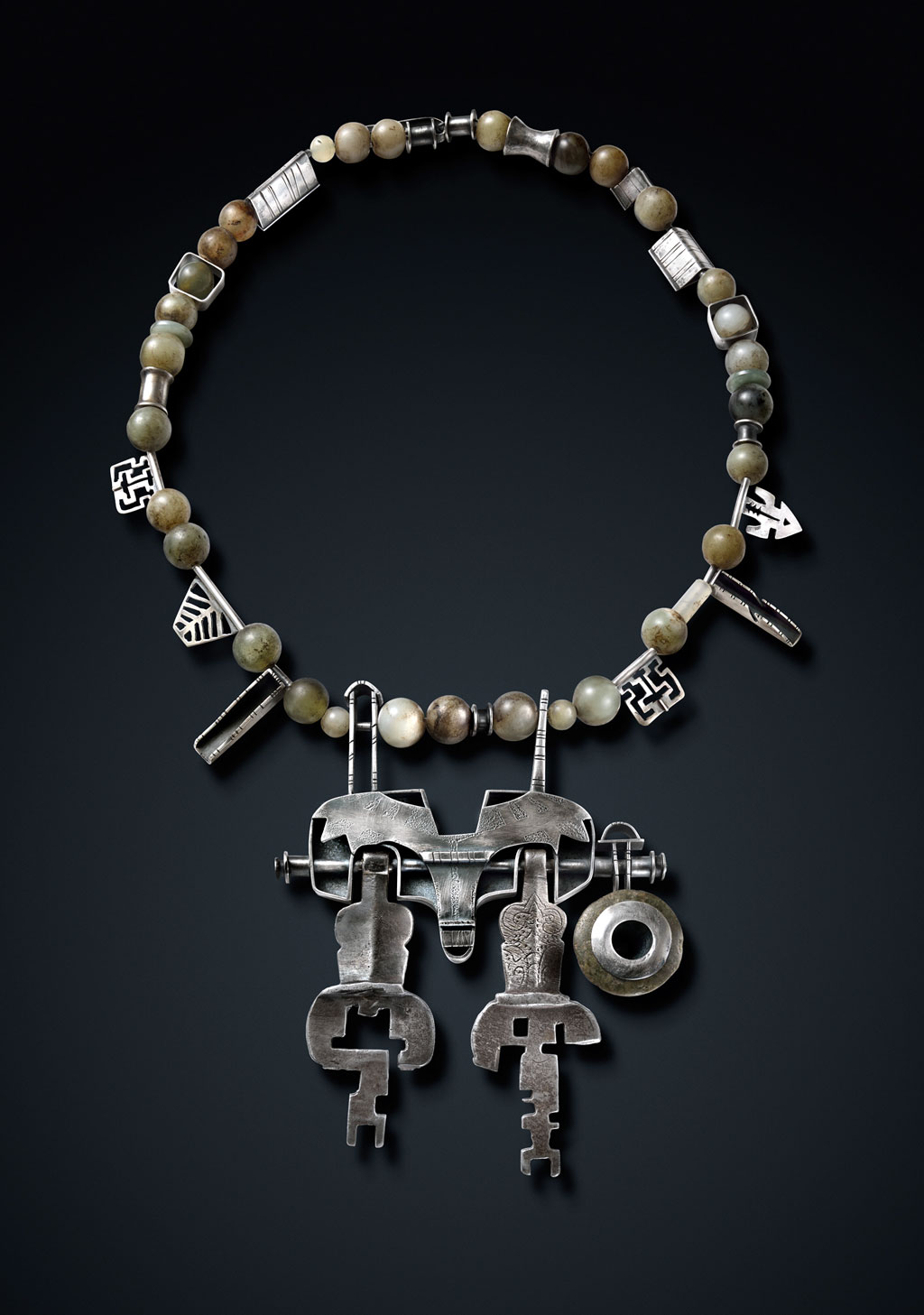 Ron Ho, Tibetan Reliquary, 2012. Fabricated and pieced silver, old Tibetan keys, jade ear plug, Chinese stone beads