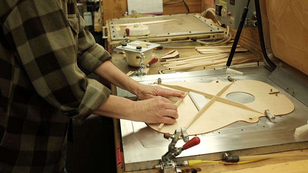 Anette Pemberton works on the X bracing. Mark Markley photograph