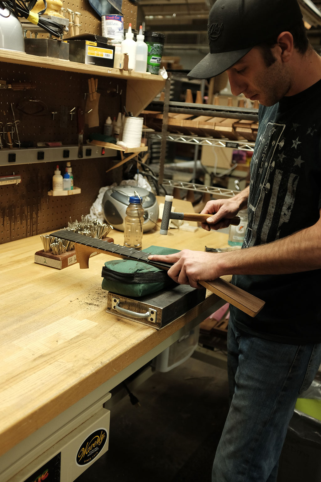 Bart Buschi hammers the frets. Mark Markley photograph