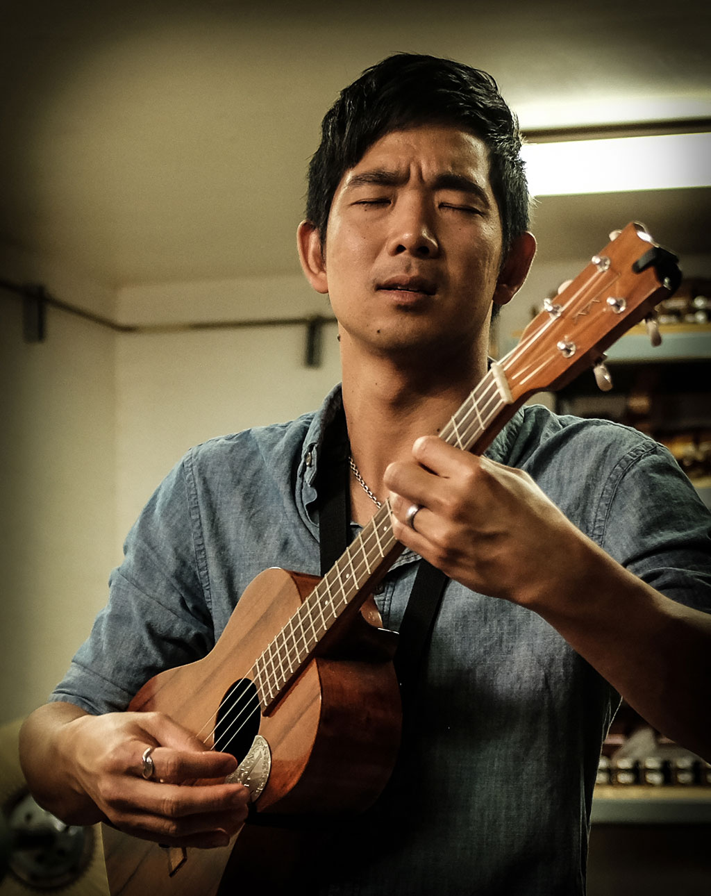 Jake Shimabukuro playing his Kamaka ukulele. Mark Markley photograph
