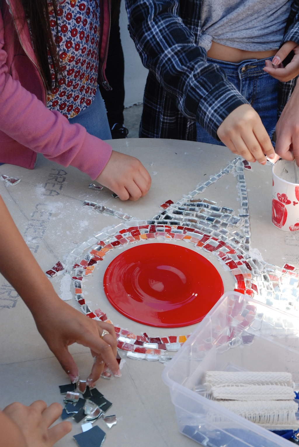 Van Nuys Students mosaic the Craft in America Logo. Photo by Madison Metro.