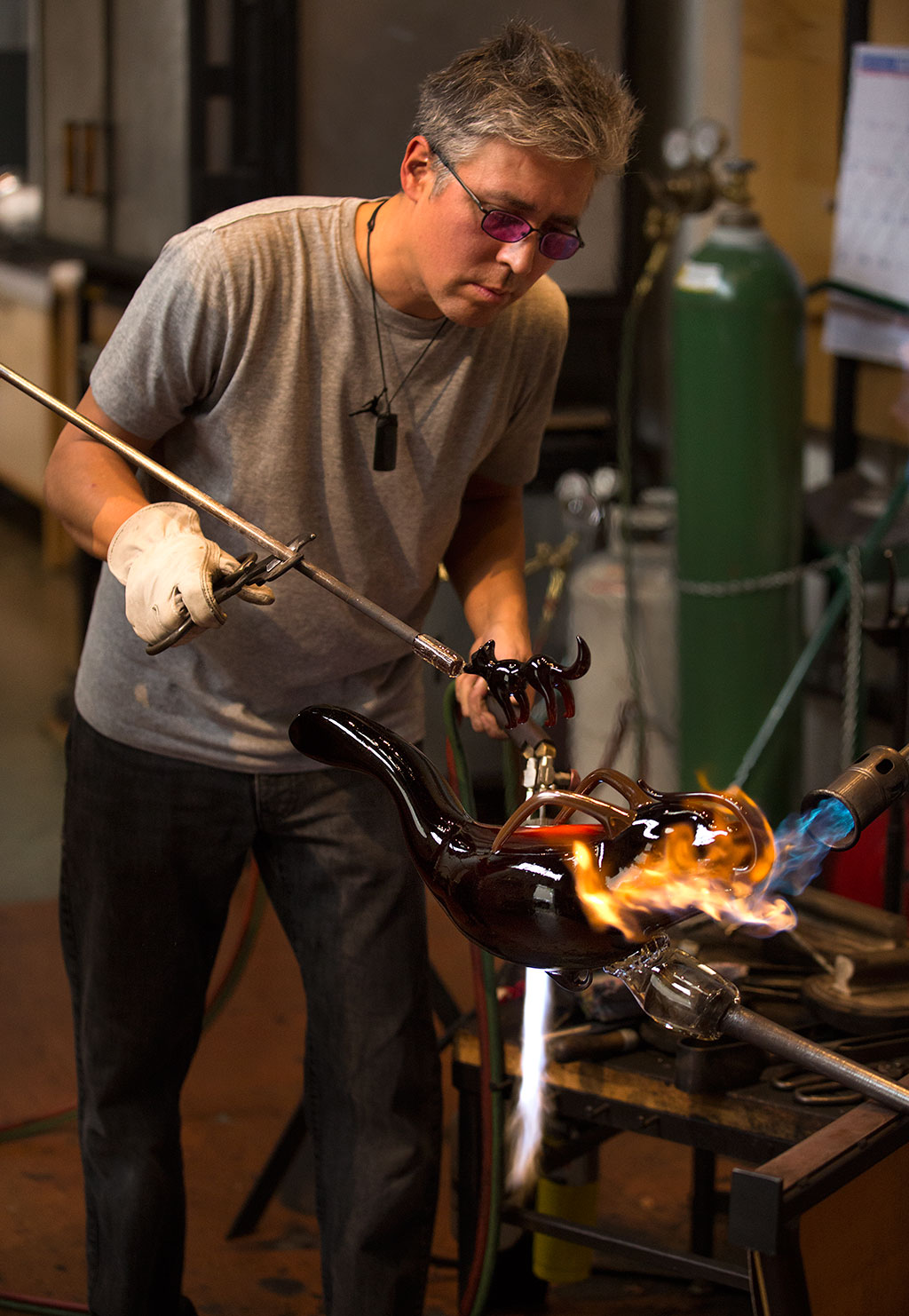 Preston Singletary working in his studio. Russell Johnson photograph