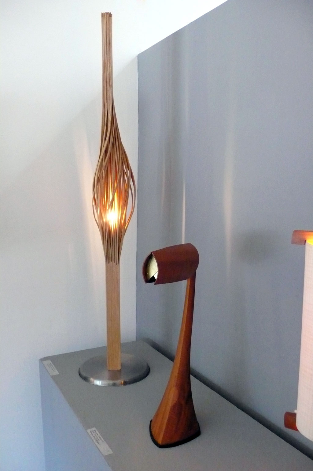 Hongtao Zhou, Energy Wood lumber floor lamp, 2016 (l). Byron Conn, Dahlia Table Lamp, 2012 (r).
