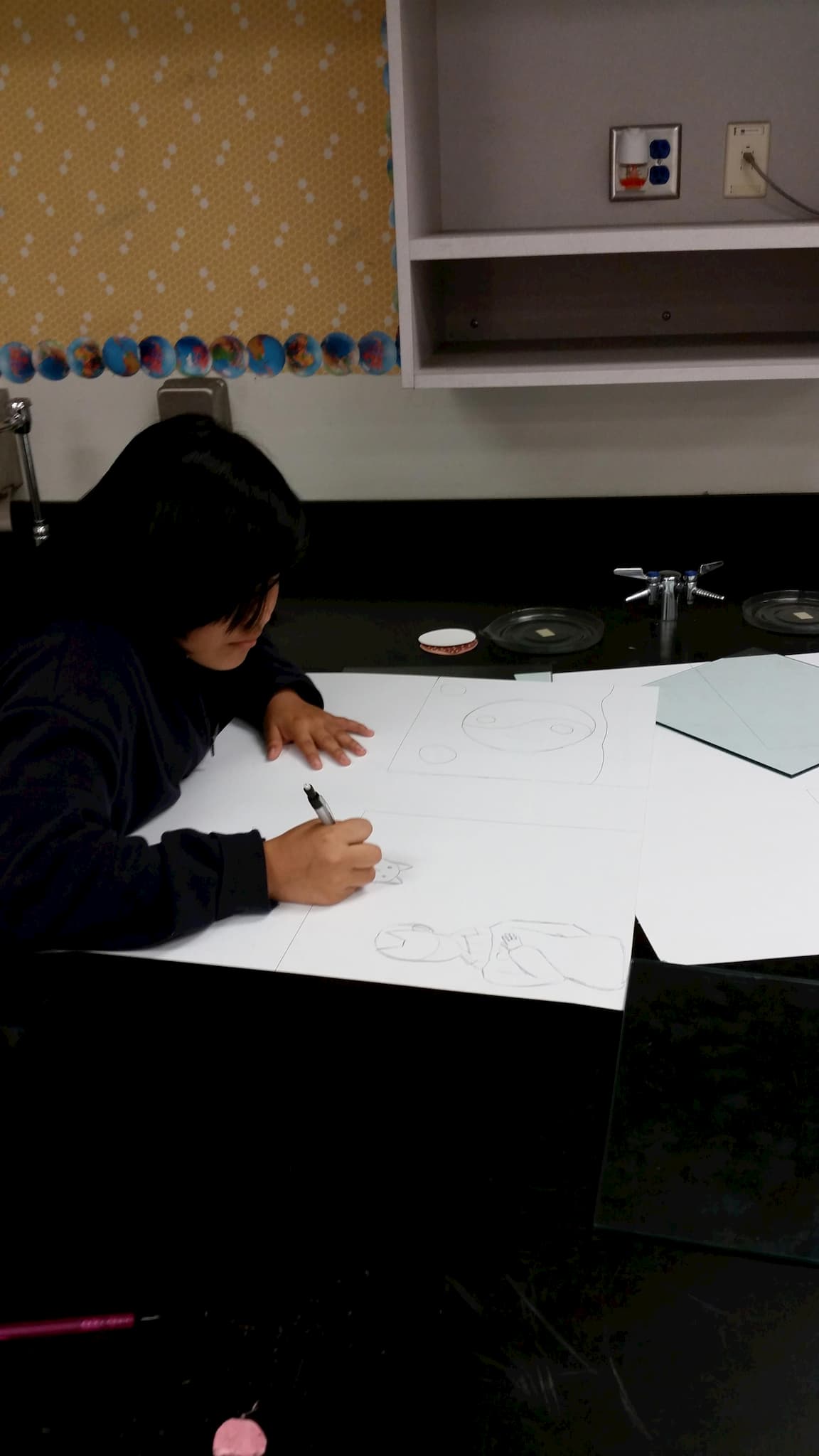 Student working on drawing