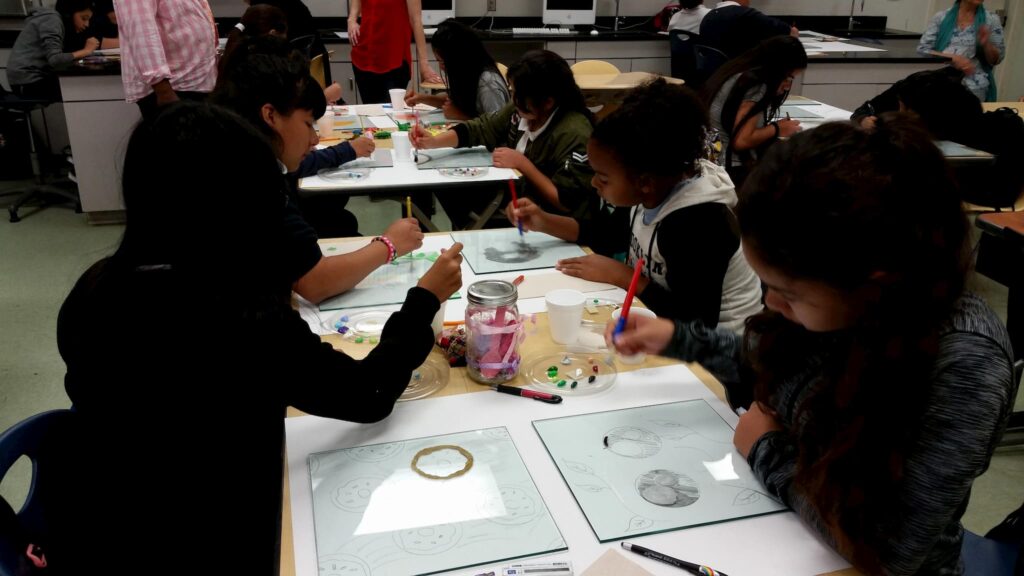 Students working on glass projects