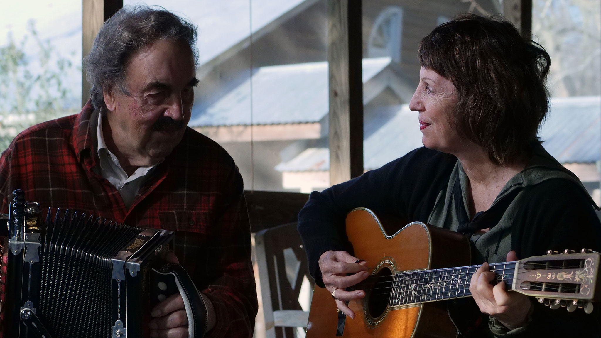 Marc Savoy on accordion and Ann Savoy on guitar. Denise Kang photo. HARMONY episode of Craft in America