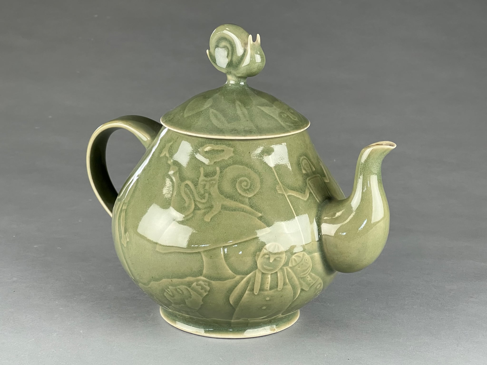 Tom Pakel (imagery by Susan Garson), Alice in Wonderland Teapot, Craft in America