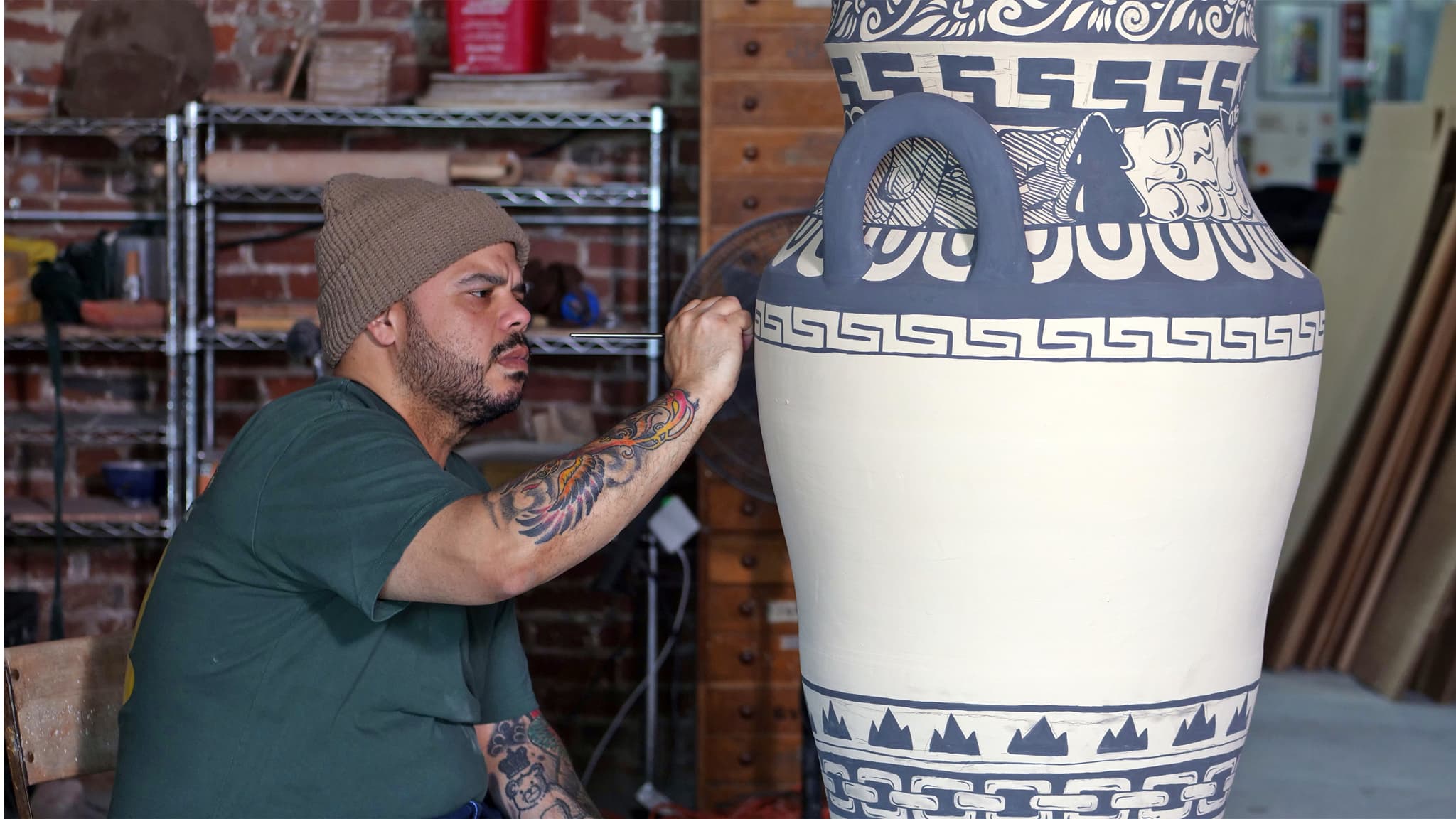 Potter Roberto Lugo glazing, Denise Kang photograph Craft in America