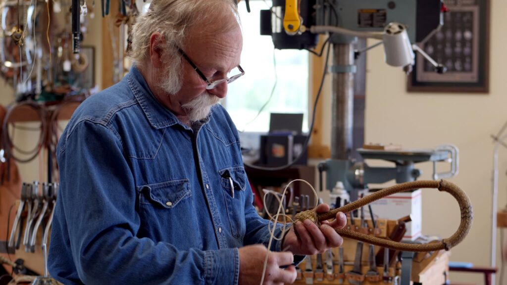 Rawhide braider Jeff Minor, Denise Kang photograph