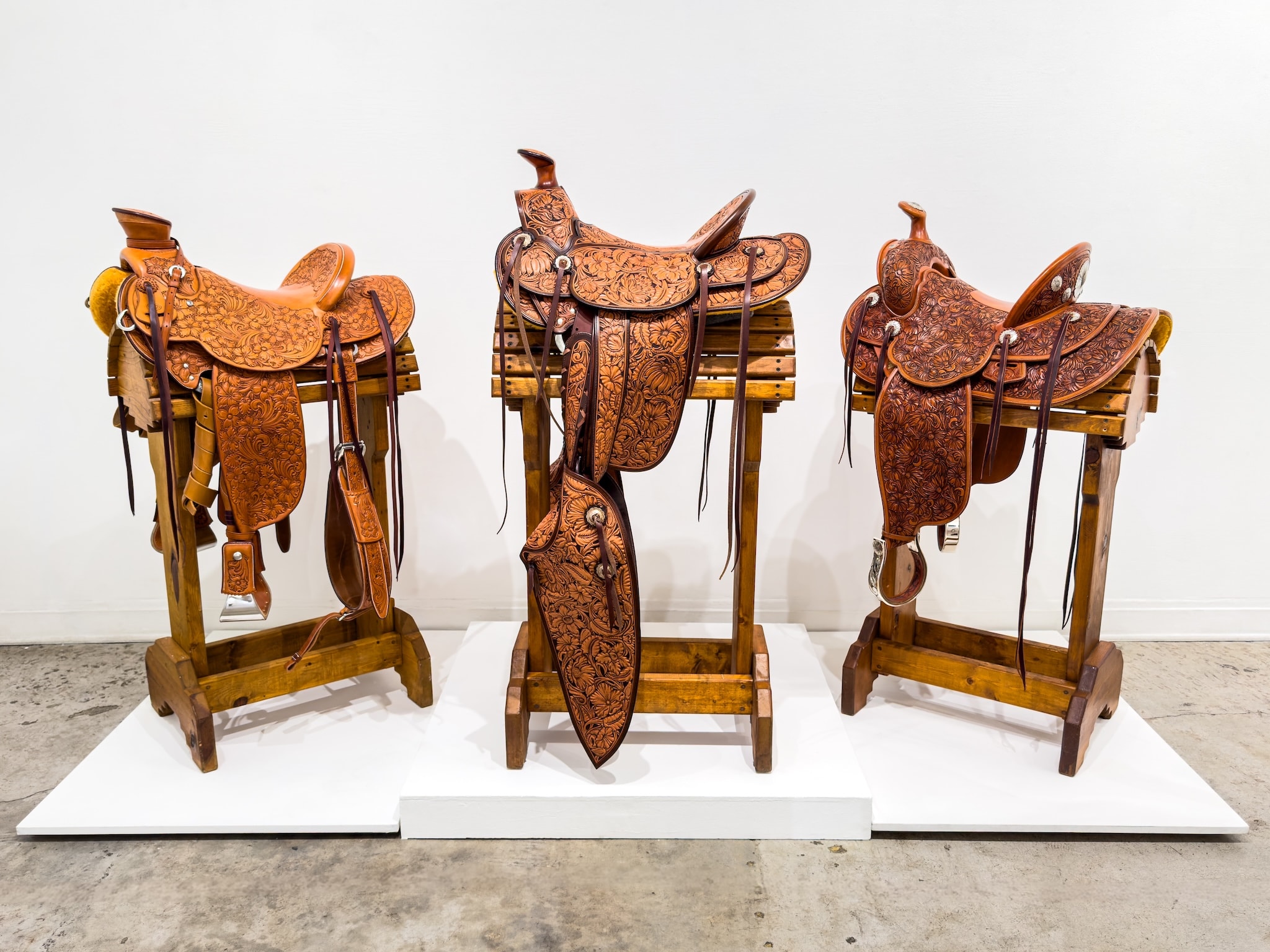 Craft in America Center, Cowboy Craft, Saddles, (Left to right: Cary Schwarz, Carol Gessell, John Willemsma), installation view, 2026