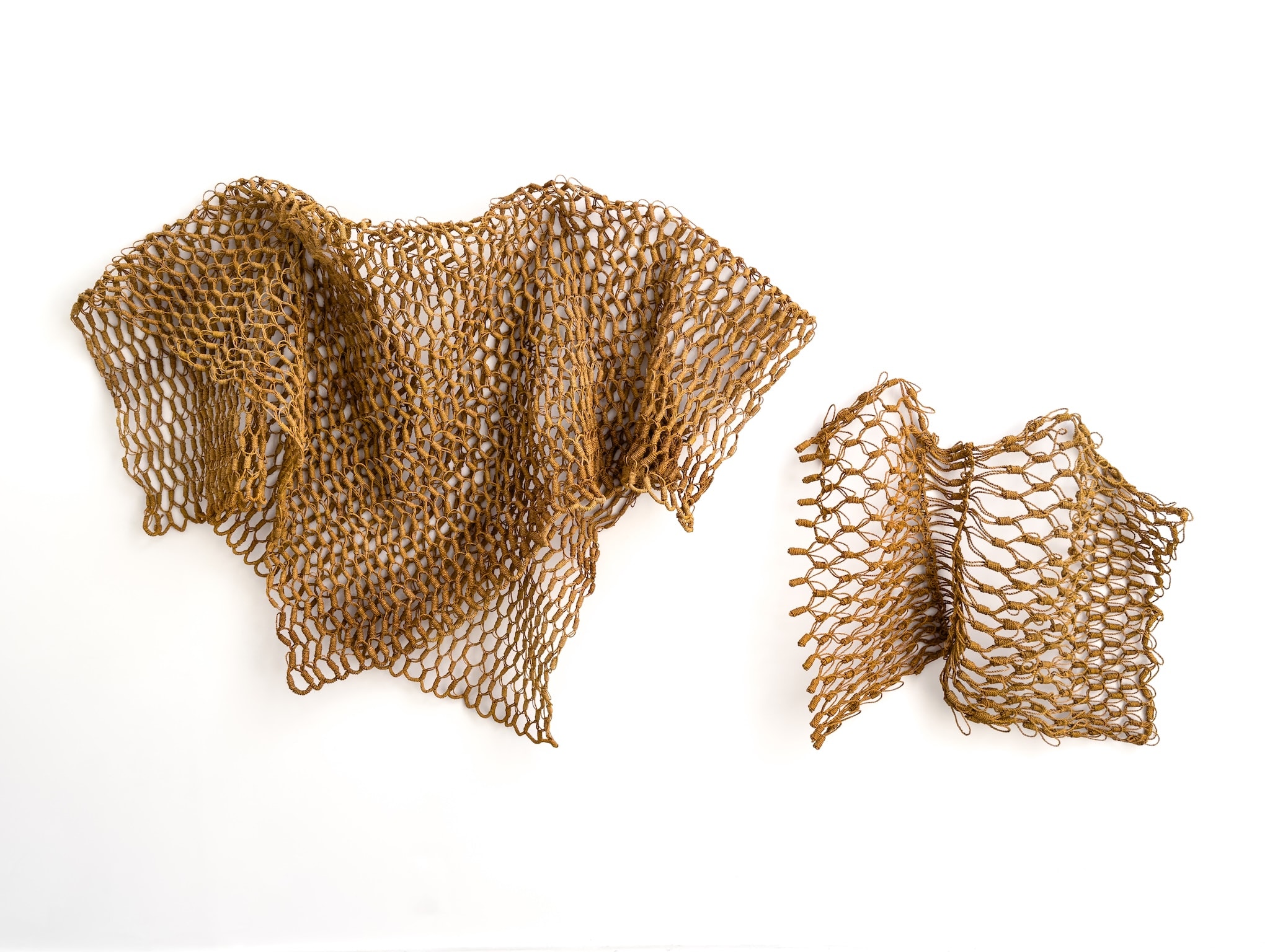 Craft in America Center, Marques Hanalei Marzan, Entwine, (left) Pa'u Mauliola (Skirt of Well-being), 2020, (right) 'A'ahu Series #68, 2018