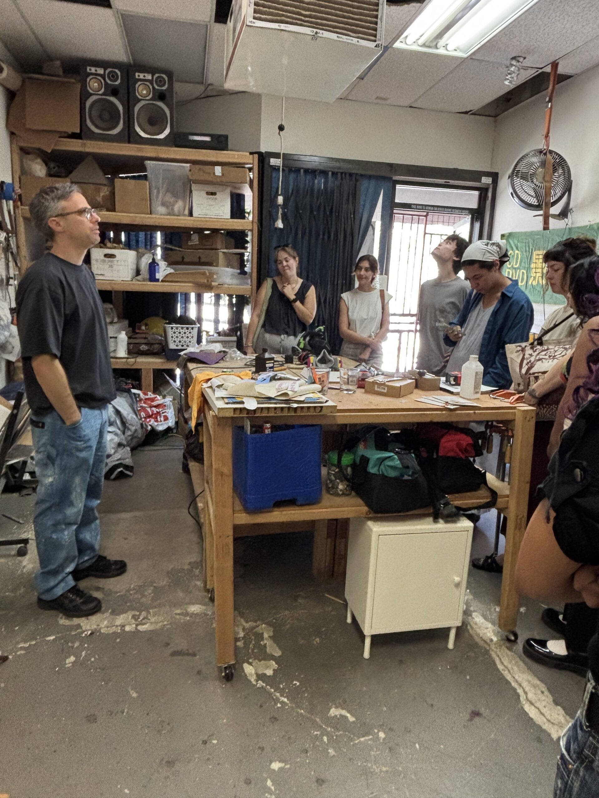 A group of getty interns around a work table in Josh Schaedel studio
