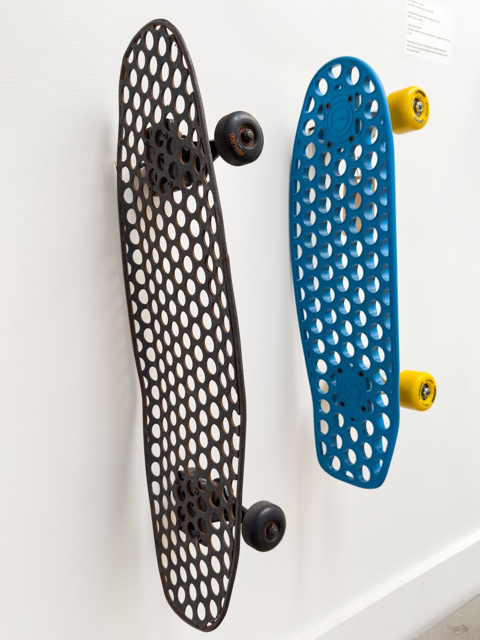 Craft in America Center, Ryan Anderson, Handmade Perforated Metal Skateboard and Lander Board, 2015/2026, Vehicles of Expression